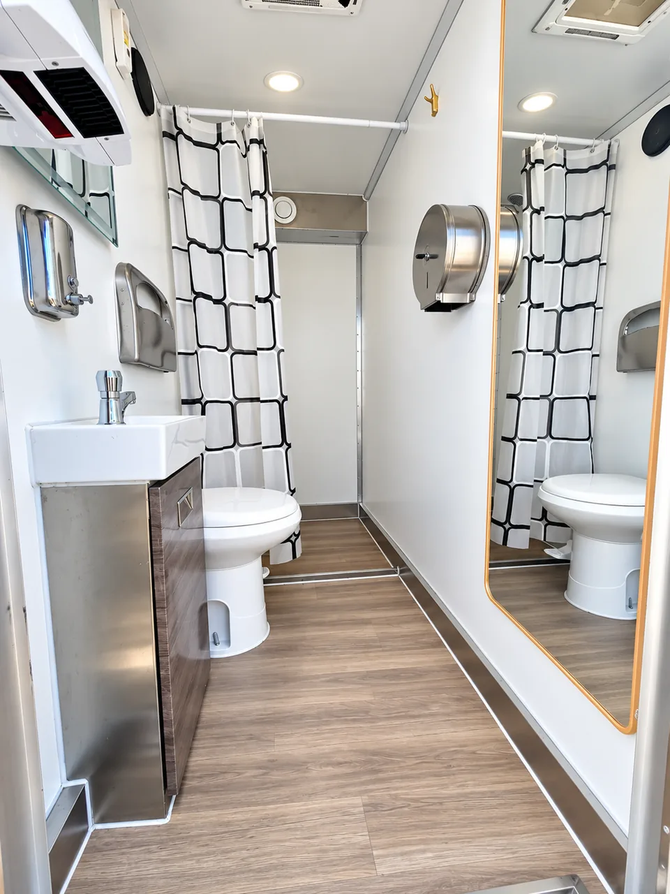 Interior of a commercial shower and restroom combination trailer rental
