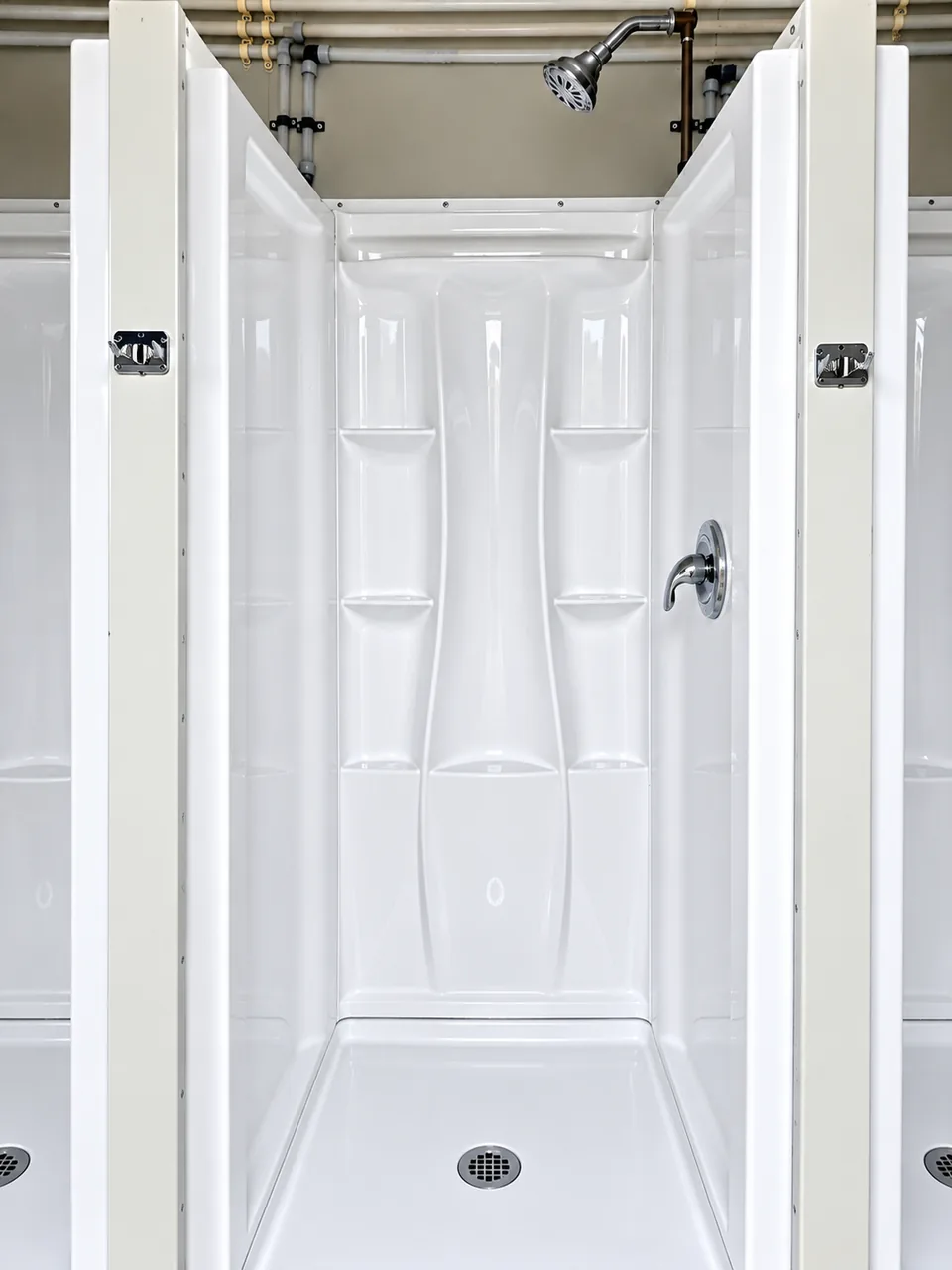 Three shower stalls in the verified 20 ft, 5-stall shower container
